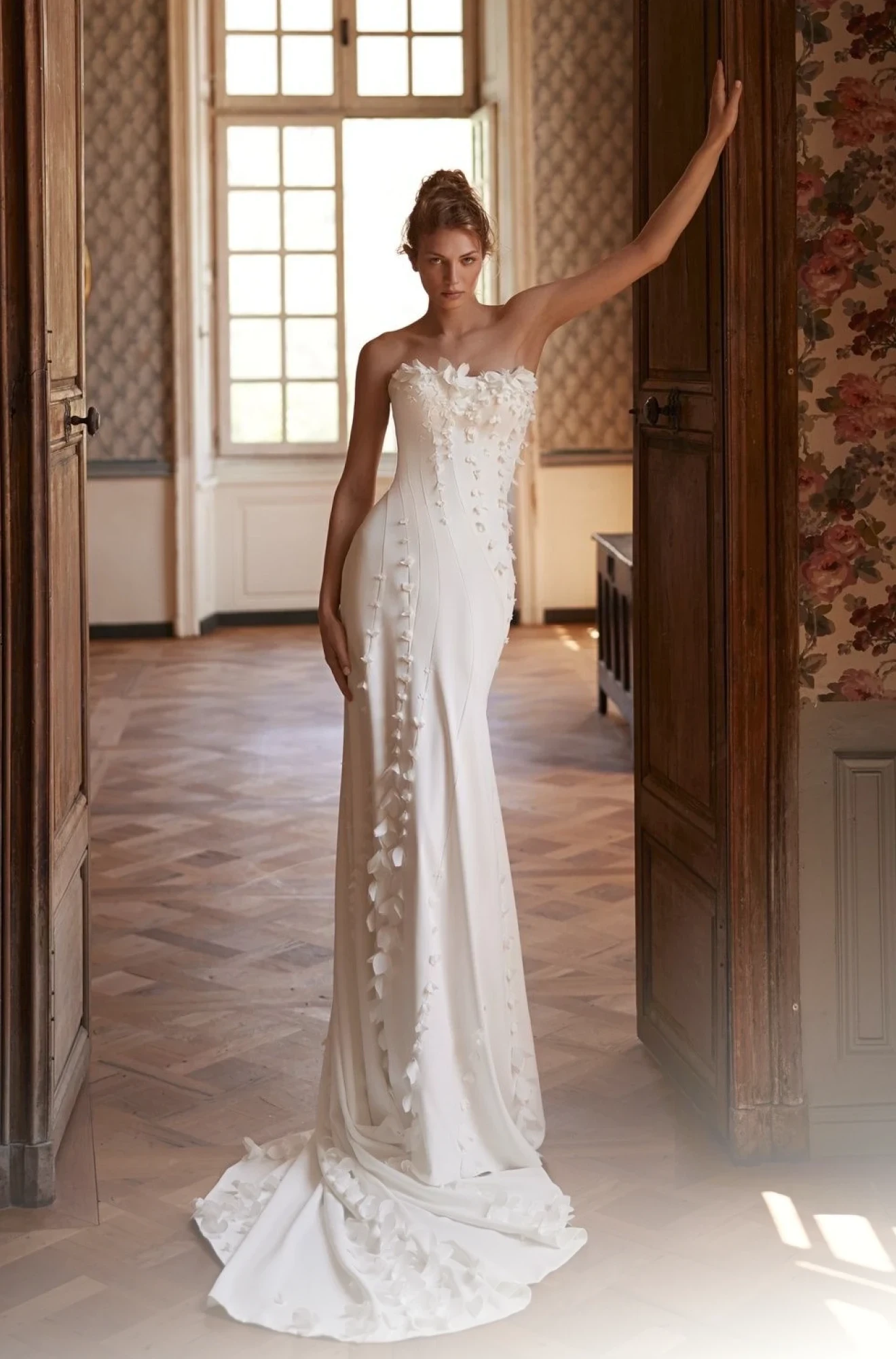 Model wearing an white gown