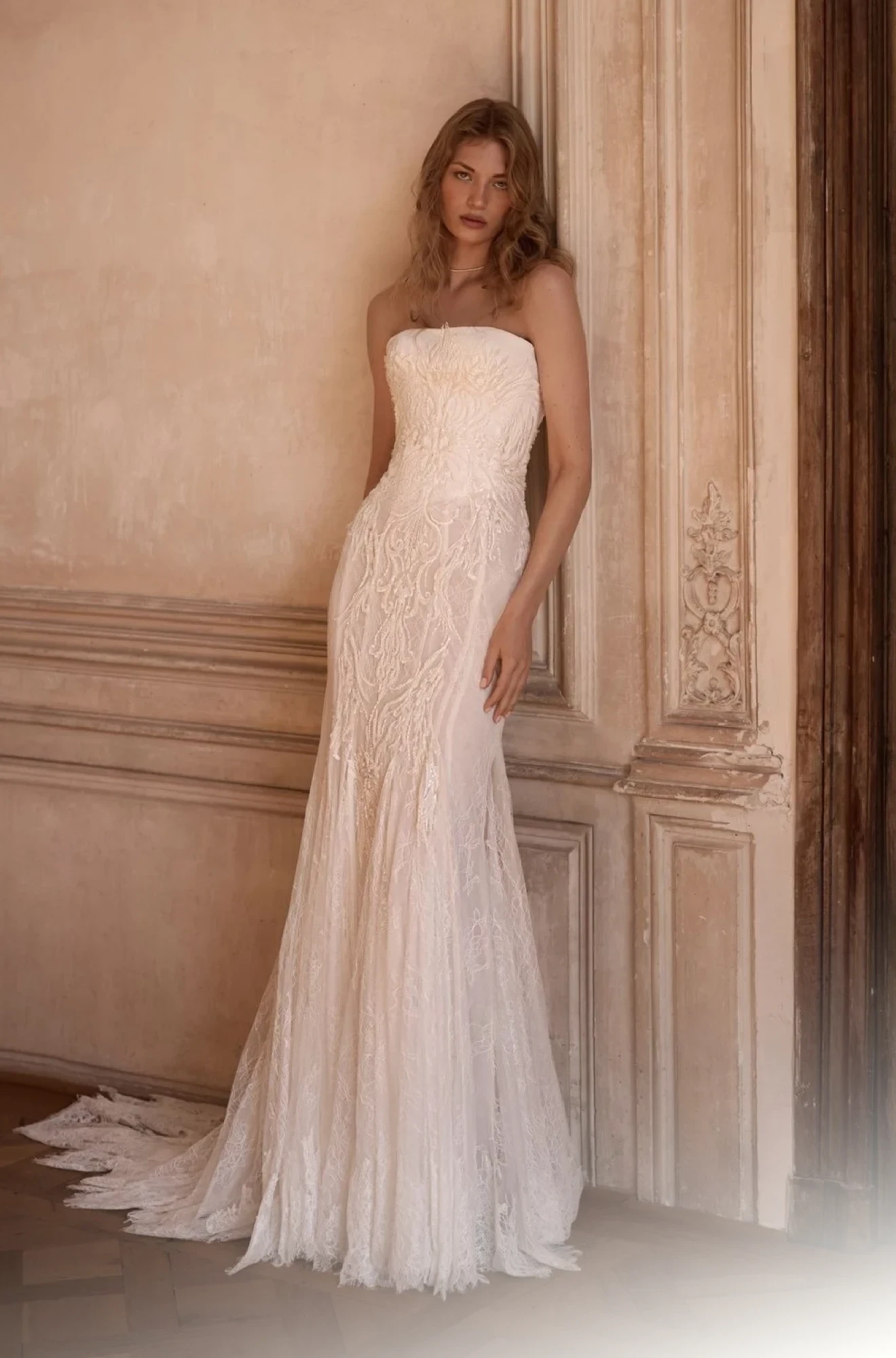 Model wearing an white gown