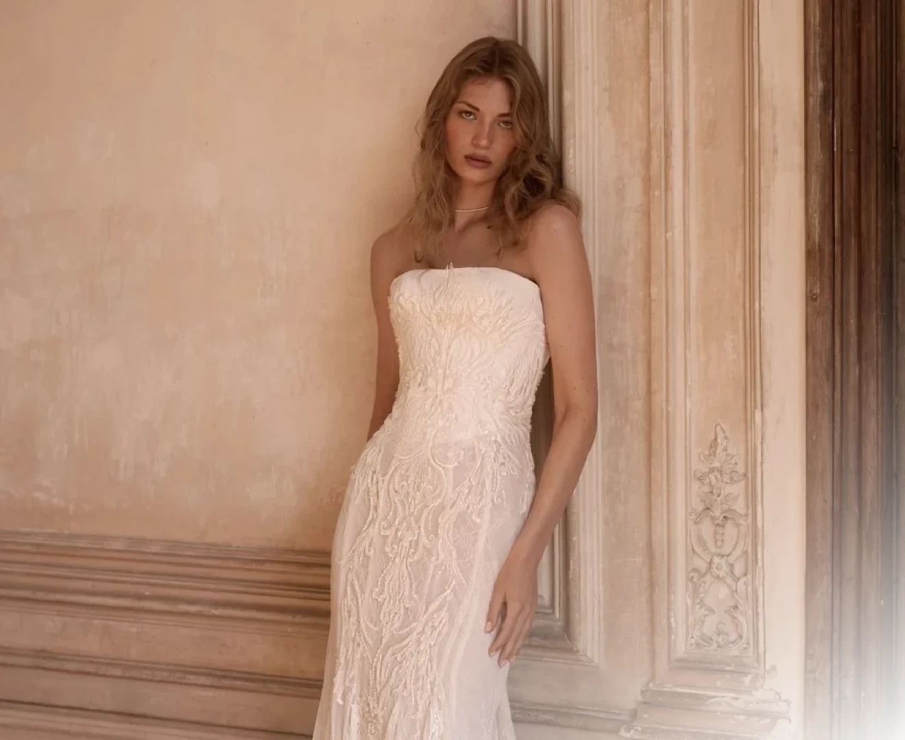 Model wearing an white gown