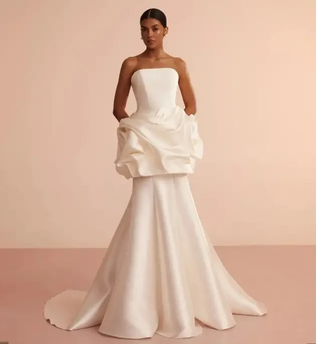 Photo of the model wearing a Convertible Collection gown