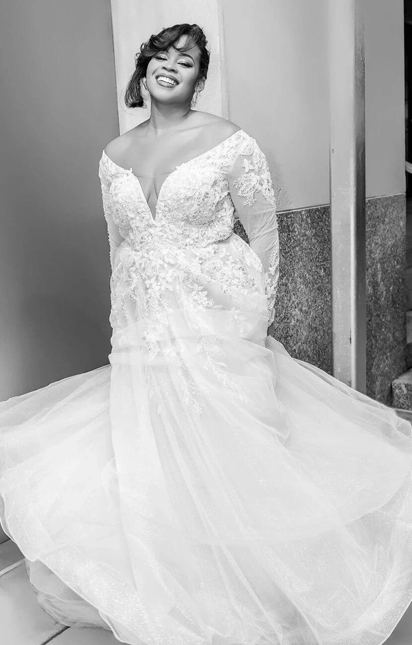 Model wearing a white gown