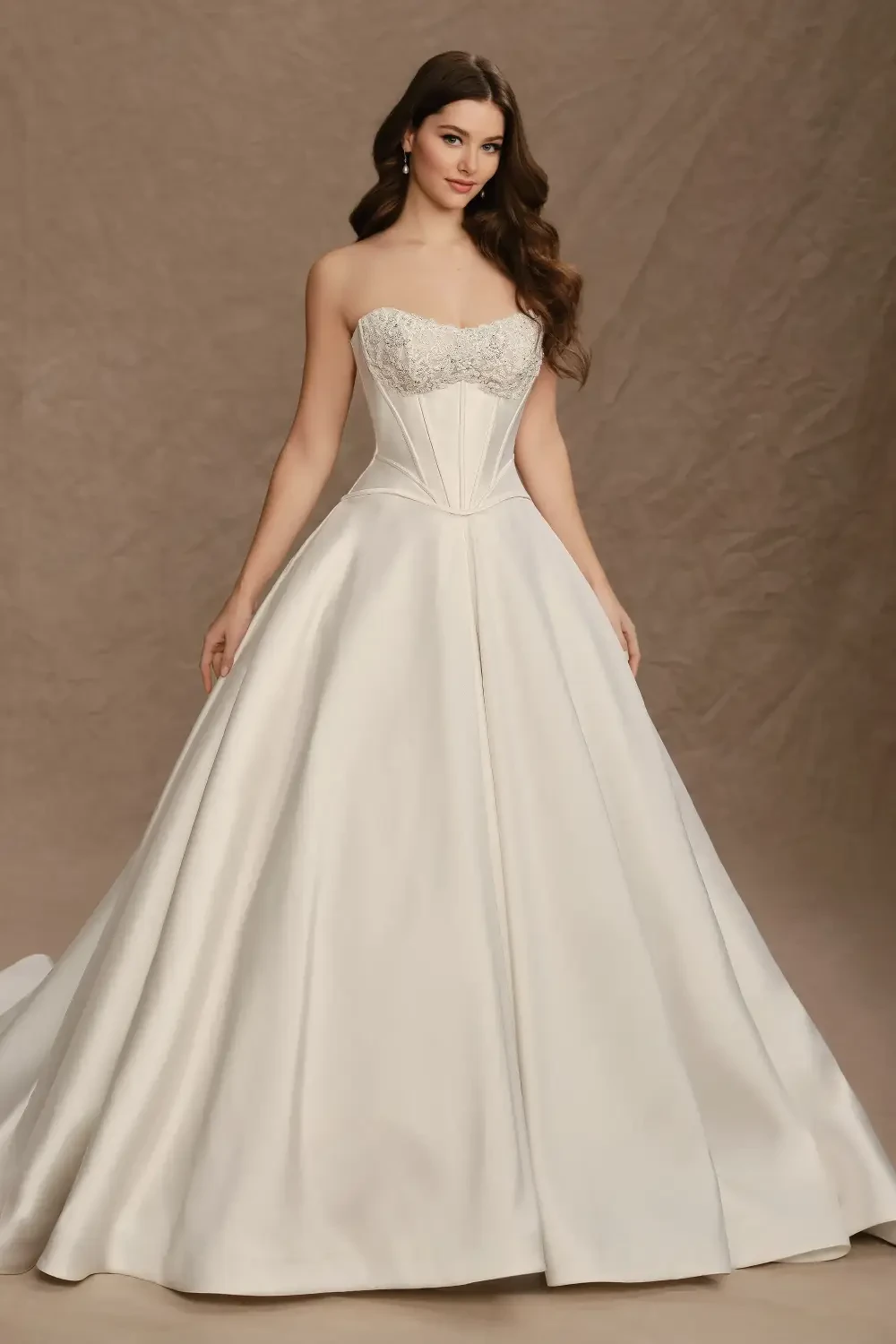 model is wearing a strapless ball gown